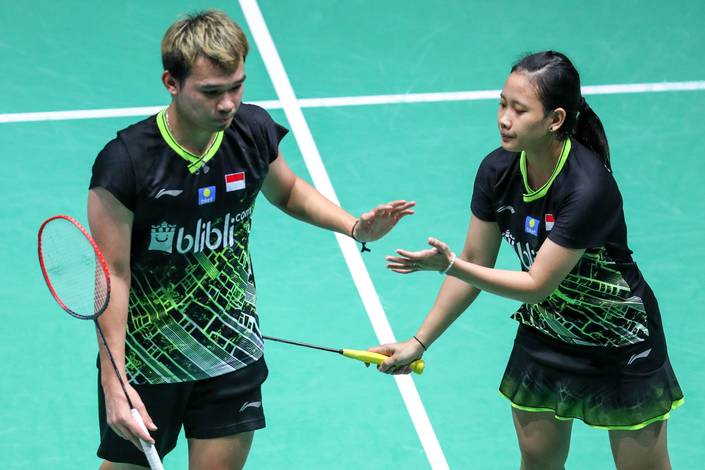 Rinov Rivaldy/Pitha Haningtyas Mentari (Indonesia) saling memberikan semangat di lapangan. Rinov Rivaldy/Pitha Haningtyas Mentari (Indonesia) saling memberikan semangat di lapangan.