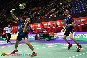 Fajar Alfian/Muhammad Rian Ardianto menghadang pengembalian.