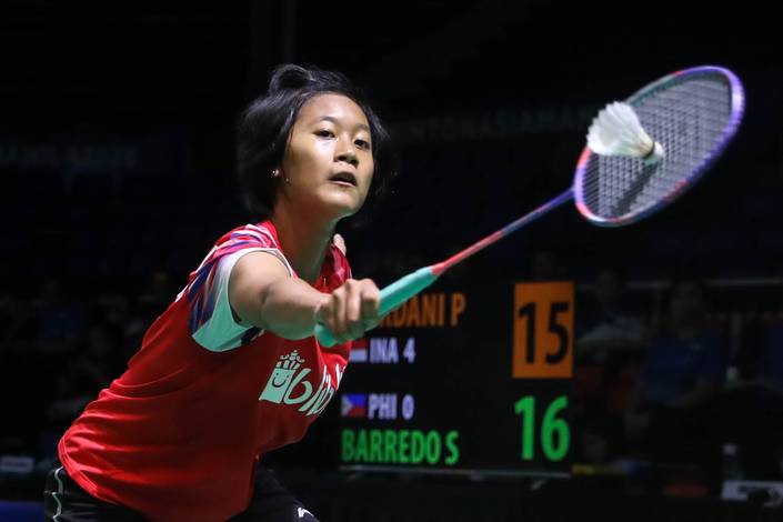 Putri Kusuma Wardani (Indonesia) mengembalikan shuttlecock. (Foto: PP PBSI) Putri Kusuma Wardani (Indonesia) mengembalikan shuttlecock. (Foto: PP PBSI)