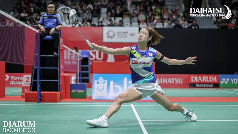Nozomi Okuhara (Jepang) mengembalikan shuttlecock. Nozomi Okuhara (Jepang) mengembalikan shuttlecock.