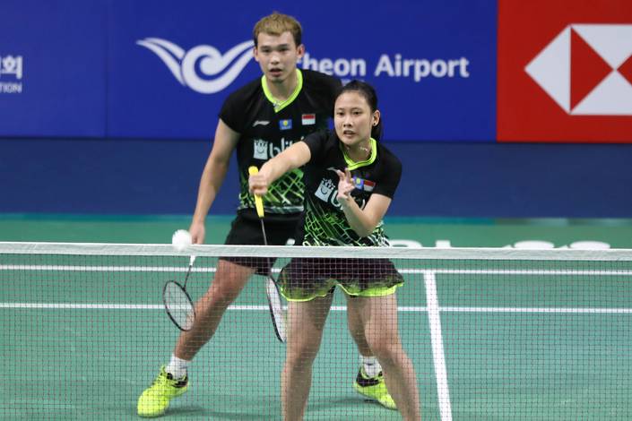 Rinov Rivaldy/Pitha Haningtyas Mentari (Indonesia) melepaskan serangan. Rinov Rivaldy/Pitha Haningtyas Mentari (Indonesia) melepaskan serangan.