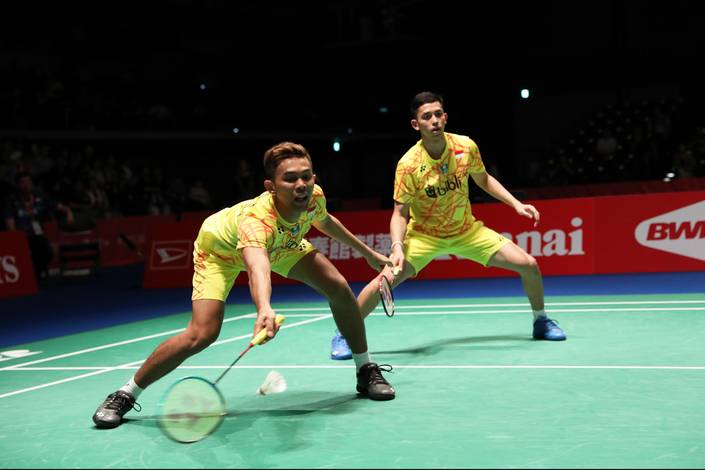 Fajar Alfian/Muhammad Rian Ardianto berusaha menghadang serangan lawan. Fajar Alfian/Muhammad Rian Ardianto berusaha menghadang serangan lawan.