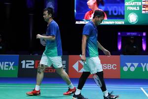 Ekspresi kekecewaan Hendra Setiawan/Mohammad Ahsan (Indonesia).