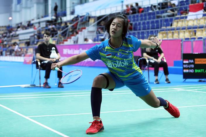 Putri Kusuma Wardani (Indonesia) mengembalikan shuttlecock. Putri Kusuma Wardani (Indonesia) mengembalikan shuttlecock.
