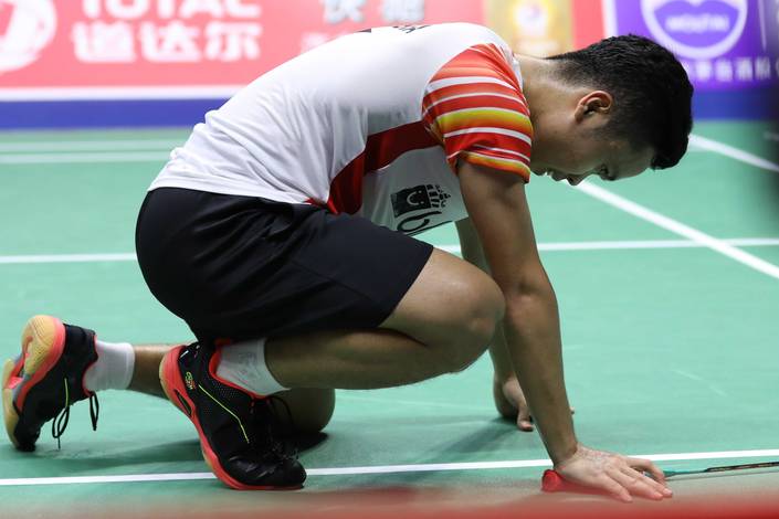Ekspresi kekecewaan Anthony Sinisuka Ginting (Indonesia).  Ekspresi kekecewaan Anthony Sinisuka Ginting (Indonesia).