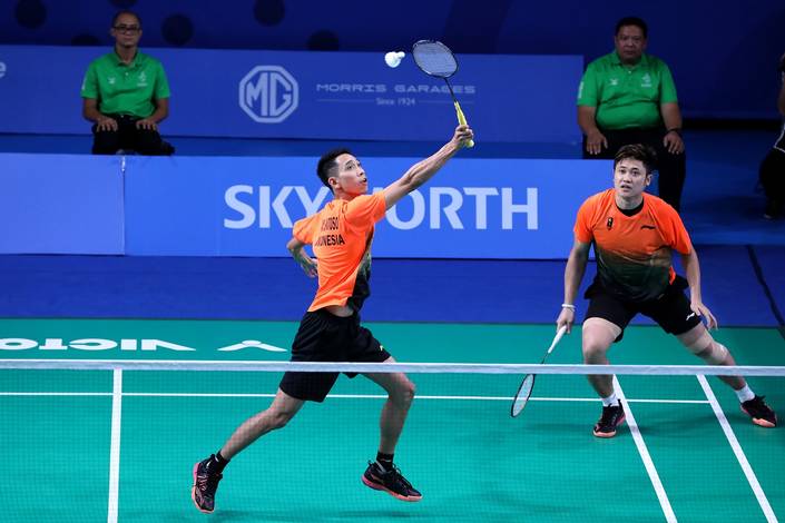 Wahyu Nayaka Arya Pankaryanira/Ade Yusuf Santoso (Indonesia) mengembalikan shuttlecock. Wahyu Nayaka Arya Pankaryanira/Ade Yusuf Santoso (Indonesia) mengembalikan shuttlecock.