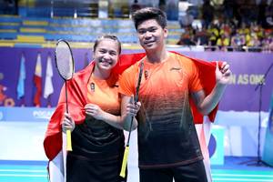 Praveen Jordan/Melati Daeva Oktavianto (Indonesia) sukses merebut medali emas SEA Games 2019 Filipina.